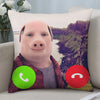 A novelty throw pillow featuring a cartoon pig face with a green phone icon on the chest.