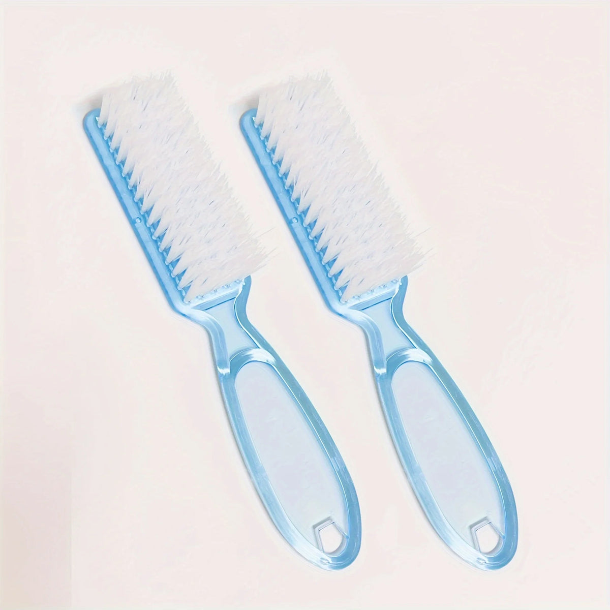 A pair of light blue nail art brushes with long handles are shown against a white background.