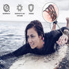 A woman is lying on a wet rock in the water, holding and examining a braided leather cord for jewelry making.