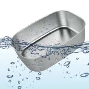A silver portable electric lunch box is shown submerged in water with bubbles.