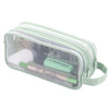 A clear mesh pencil case in light green holding various writing tools and supplies.