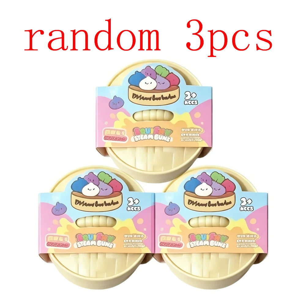 Drei zufällige weiche Dumpling-Sensorspielzeuge in rosa und gelbem Verpackung