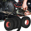Rouleaux de ruban isolant électrique noir utilisés pour envelopper des fils dans un faisceau électrique automobile.