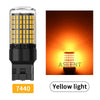 A yellow LED light bulb with a clear glass envelope and black base, showing its bright illumination.