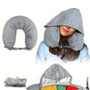 A gray fillable hooded travel pillow being worn by a woman, shown with its storage bag and fabric.