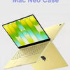 A yellow Mac Neo laptop is shown with a translucent green and yellow silicone case.