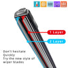 Close-up view of a black windshield wiper blade with layered design features.