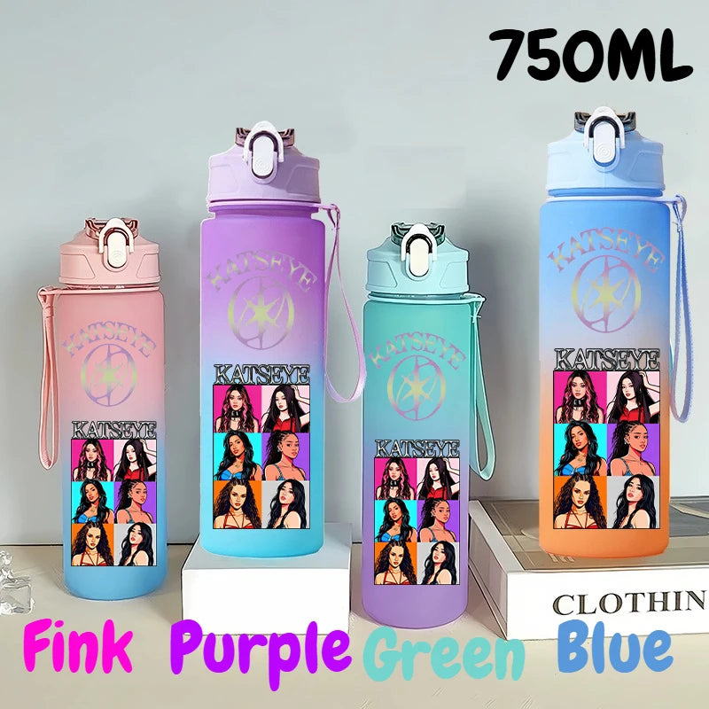 A set of three 750ml portable sports water bottles in pink, purple, and blue colors displayed on a white surface.