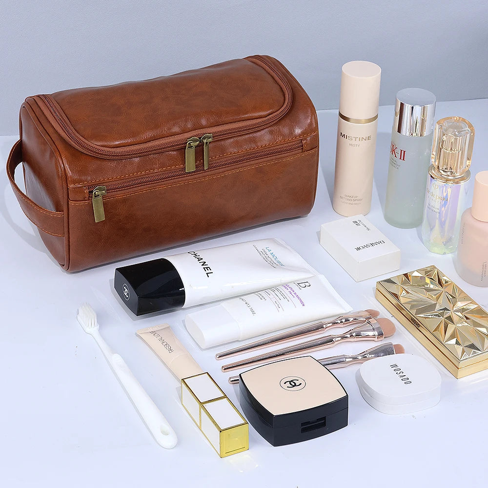 A brown PU vintage luxury toiletry bag is shown with various cosmetic and grooming products.