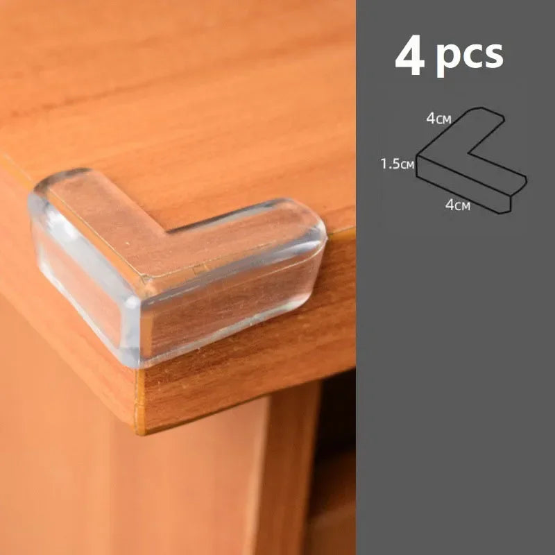 Four silicone corner edge guards in various sizes are shown against a wooden surface for baby safety.