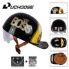 Black motorcycle helmet with gold Boss logo and a yellow visor, shown next to its packaging.