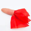 A red silk magic thumb tip with a classic design shown next to a finger.