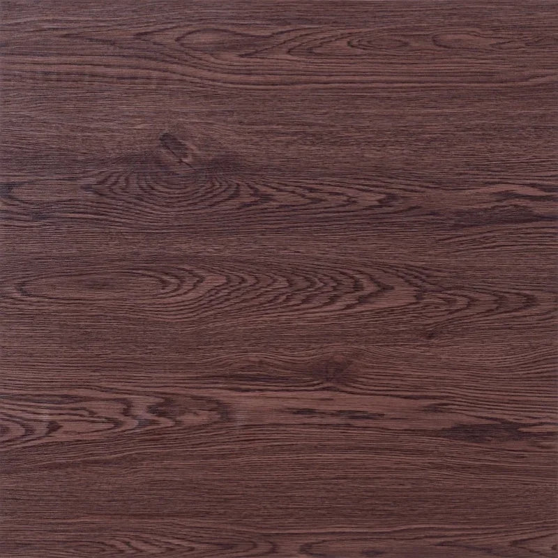 Close-up of dark brown wood grain vinyl flooring tiles showing natural wood texture and pattern.