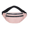A pink nylon waist pack with a black adjustable strap and a zippered pocket.