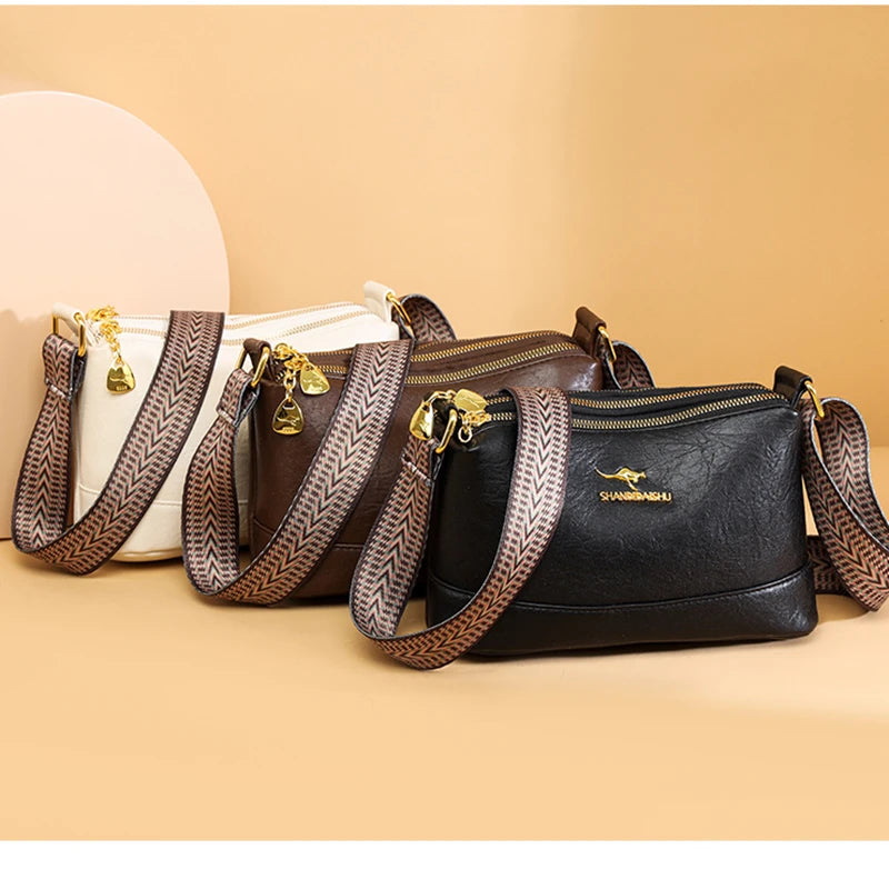 A collection of brown and black PU leather crossbody shoulder bags with patterned straps displayed on a light background.