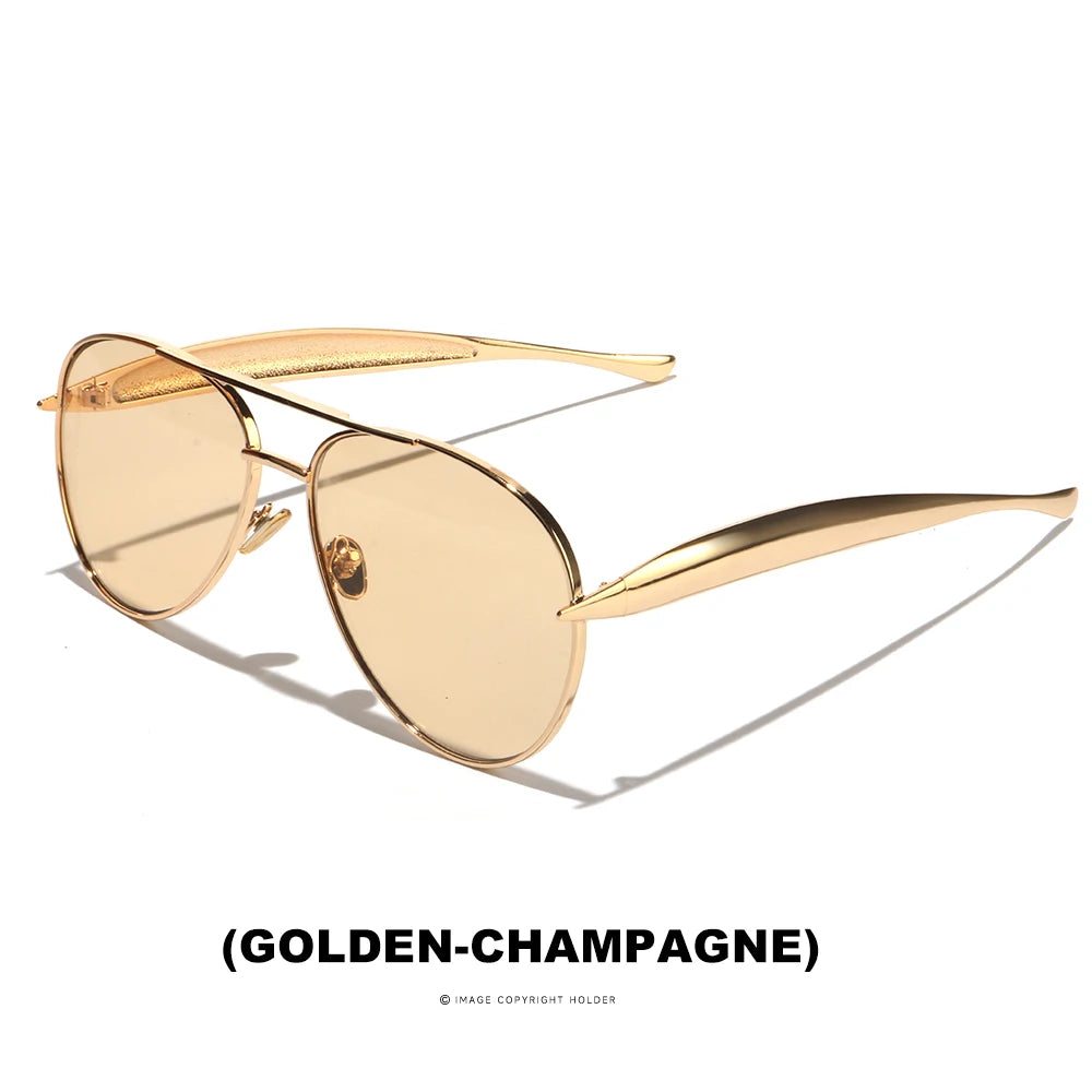 Golden-champagne oversized aviator sunglasses with a gold frame and gradient lenses