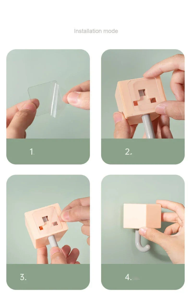 Installation steps showing how to attach an adhesive hook to a surface.