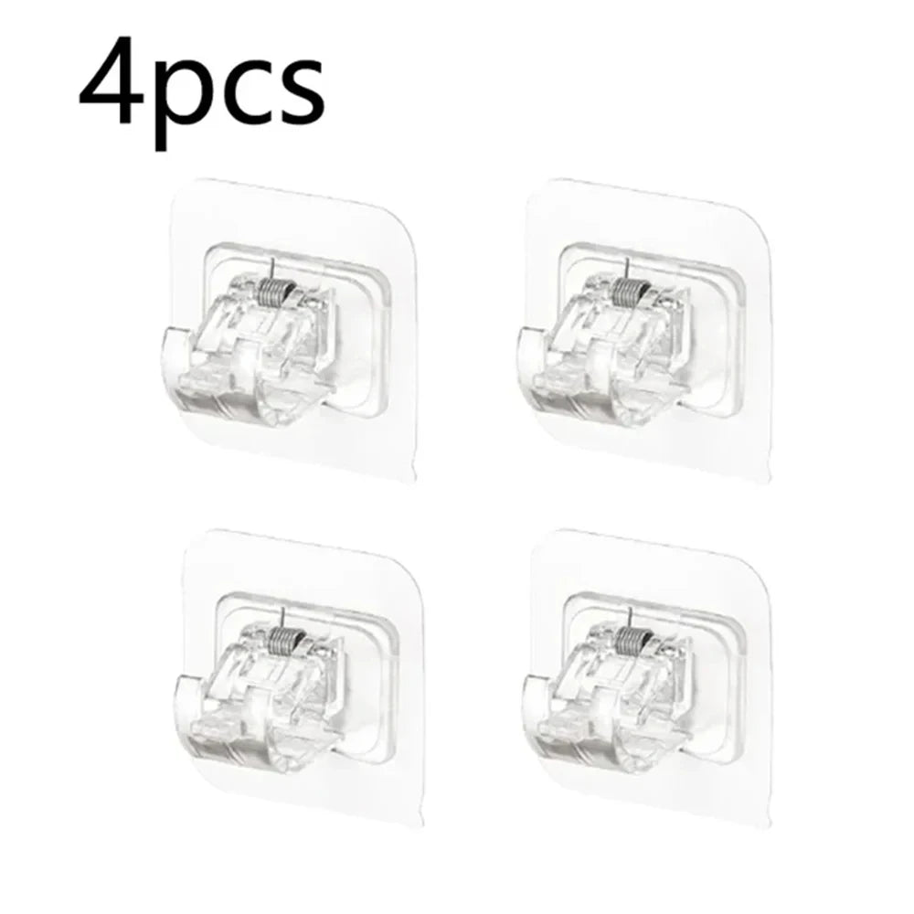 A set of four clear self-adhesive curtain rod hooks packaged in individual plastic holders.