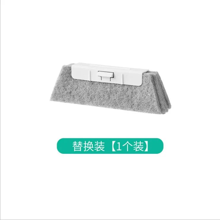 A gray multi-surface gap cleaning brush with a white plastic handle and scouring pad.