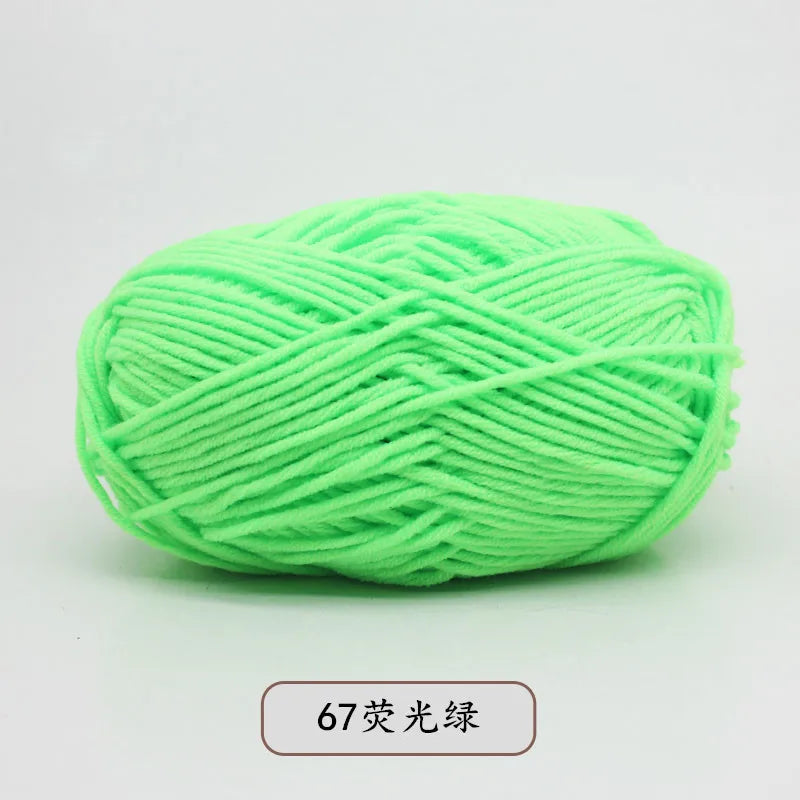 A ball of bright lime green 67 light-colored yarn for knitting and crochet.