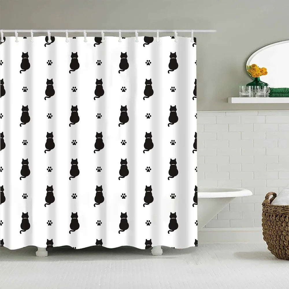 White shower curtain featuring a repeating pattern of black cartoon cats with paw prints.