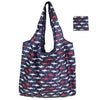 A navy blue floral shopping tote bag with a matching patterned carry pouch.