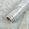 Roll of waterproof self-adhesive marble wallpaper featuring gray and beige veining on a light background.