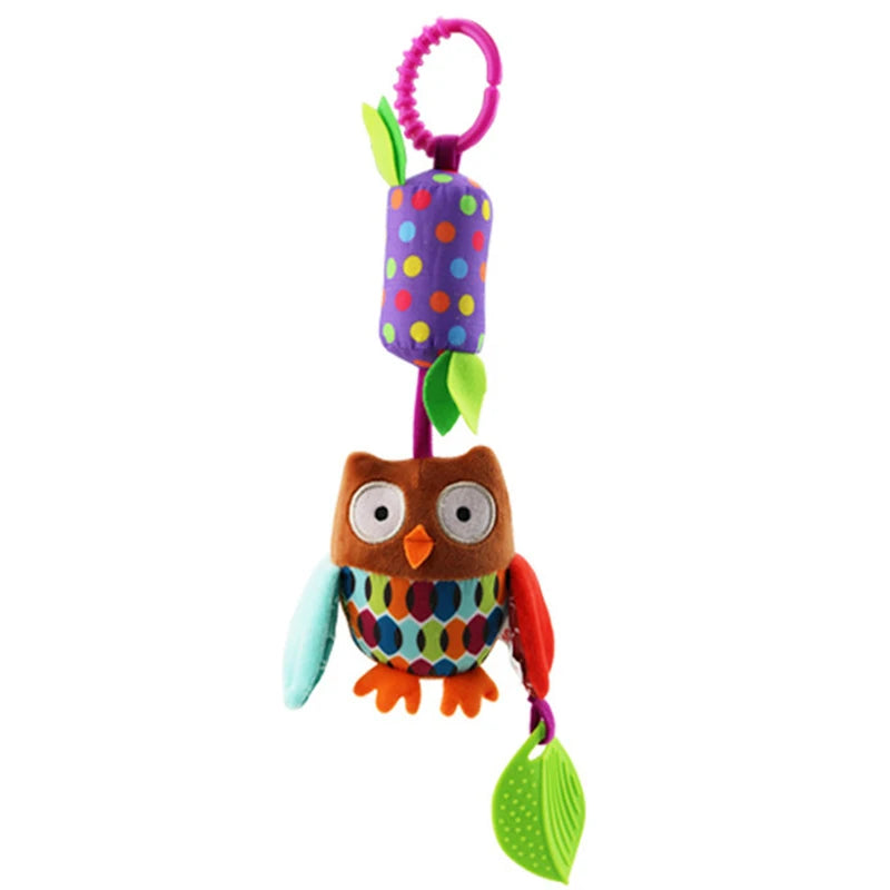 A soft plush cartoon animal rattle toy with a purple hanging bell and green leaf, designed as a stroller mobile.
