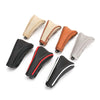 A collection of leather gear shift knob covers in various shades including beige, brown, gray, and black.