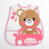 A pink and white wipeable baby bib featuring a brown teddy bear design with a catch-all pocket for weaning toddlers.