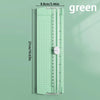 A green A4 mini paper trimmer with a precision cutter shown vertically.