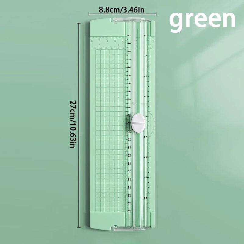 A green A4 mini paper trimmer with a precision cutter shown vertically.
