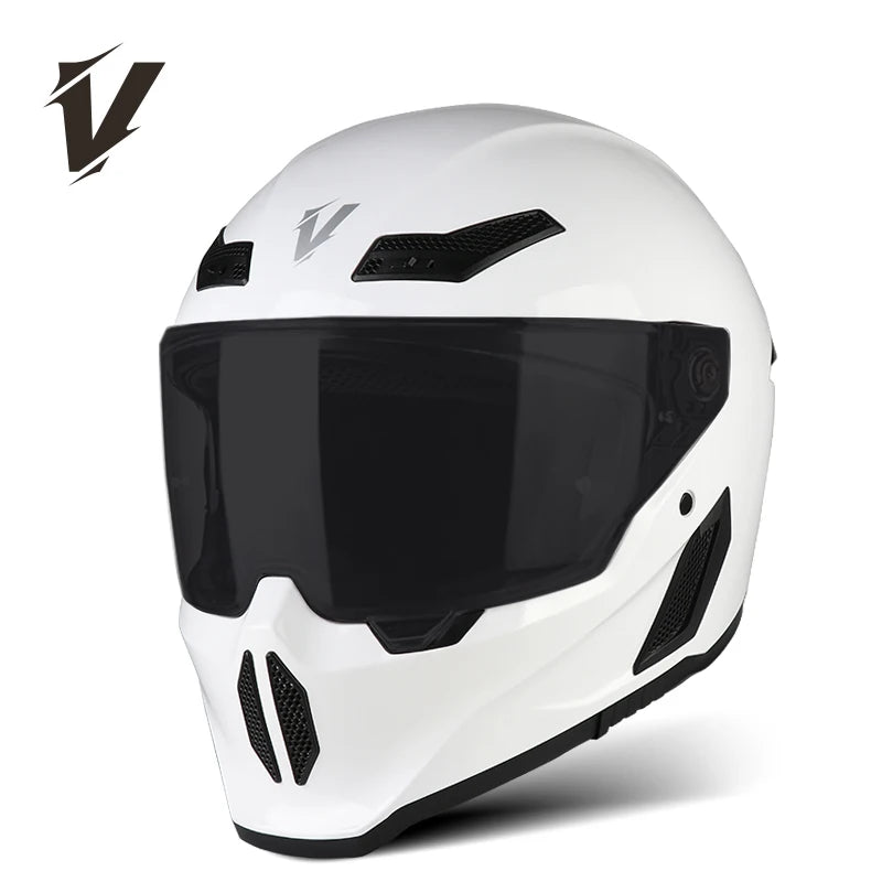 A white full-face motorcycle helmet with a black visor and ventilation slots.