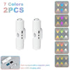 Two white rechargeable motion sensor LED night lights with RGB mood lighting and a USB charging cable