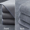 Front and back views of an ultra-soft coral fleece car drying towel in gray