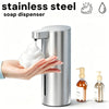 A hand dispenses soap into a stainless steel automatic foam soap dispenser.