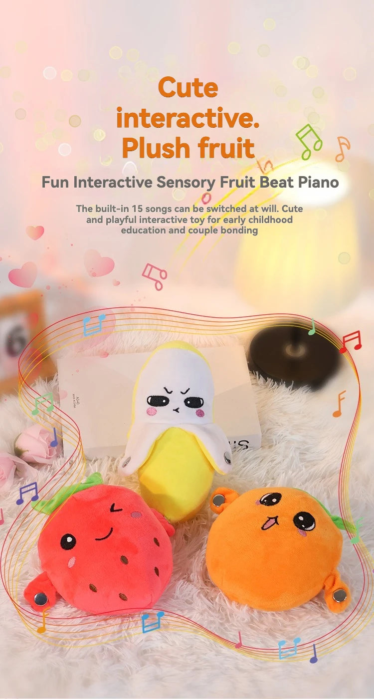 Cute fruit-shaped plush toys like strawberries and lemons used as a fun interactive sensory fruit beat piano for early childh
