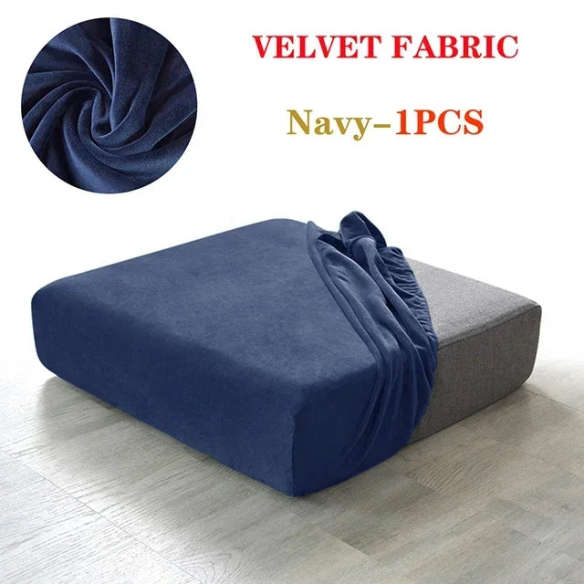 Navy velvet fabric sofa cover displayed on a gray sofa cushion.
