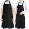 A person wearing a black unisex water-resistant bib apron with two pockets over a white shirt.