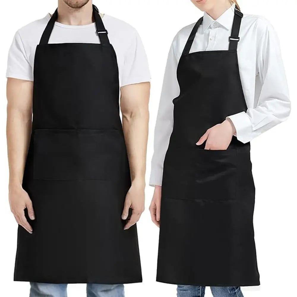 A person wearing a black unisex water-resistant bib apron with two pockets over a white shirt.