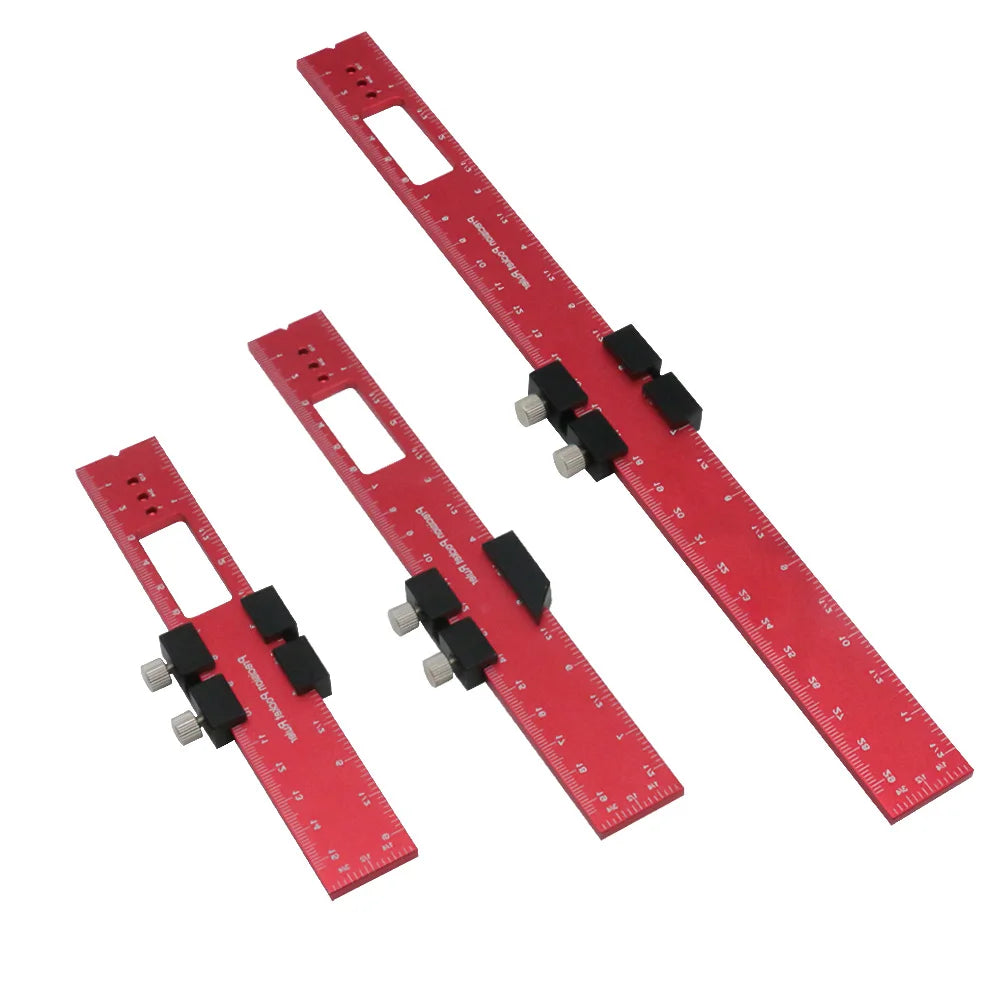 Red aluminum pocket ruler with a T-track slide stop mechanism.