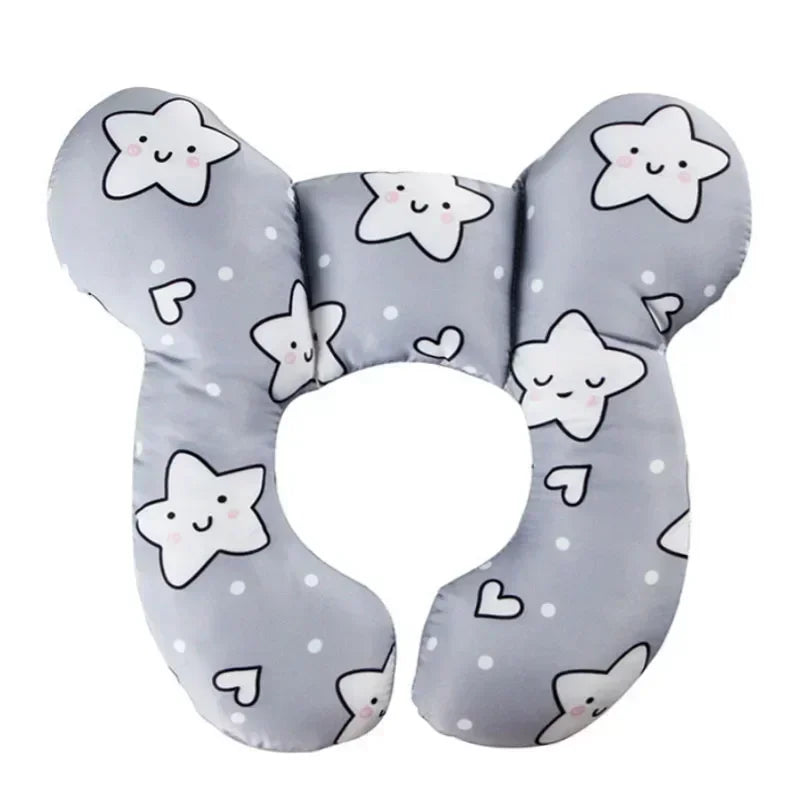 Gray baby car seat head and neck support pillow with star and heart patterns