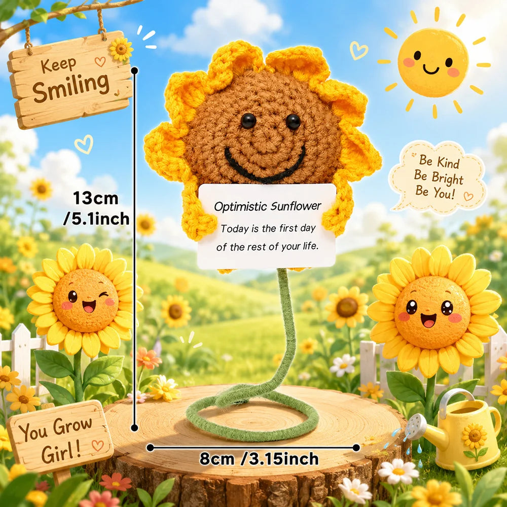Handmade crochet sunflower plush doll with a wooden sign and yellow flowers