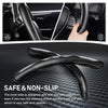 Close-up of a black carbon fiber pattern steering wheel cover demonstrating an anti-slip grip for safe driving.