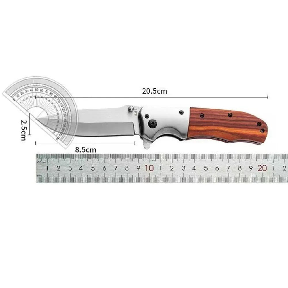 A folding pocket knife featuring a stainless steel blade and a walnut wood handle, shown with a measurement scale.