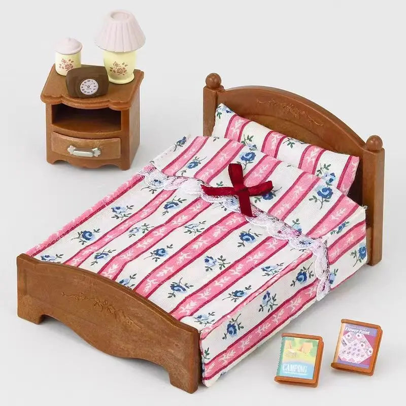 A wooden bed frame with a striped pink and white bedding set and a small lamp accessory.