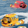 A pink remote control spray motorboat is flying over blue water, with a yellow controller visible below.