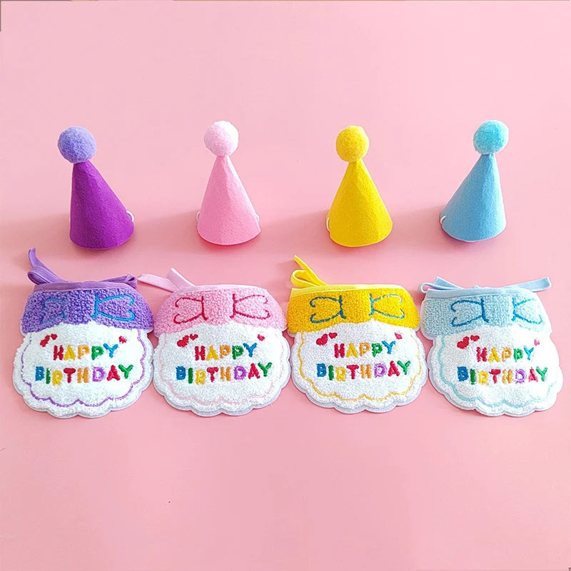 A set of pet birthday party hats and bibs for cats and small dogs in purple, pink, yellow, and blue.
