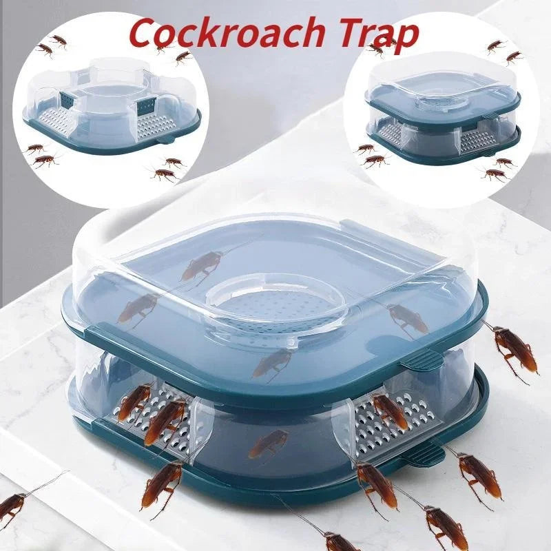 A clear plastic reusable cockroach trap with a blue lid and mesh tray catching insects on a white surface.