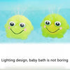 A green silicone bath toy shaped like a frog or whale is shown with an auto-sensing water dispenser.
